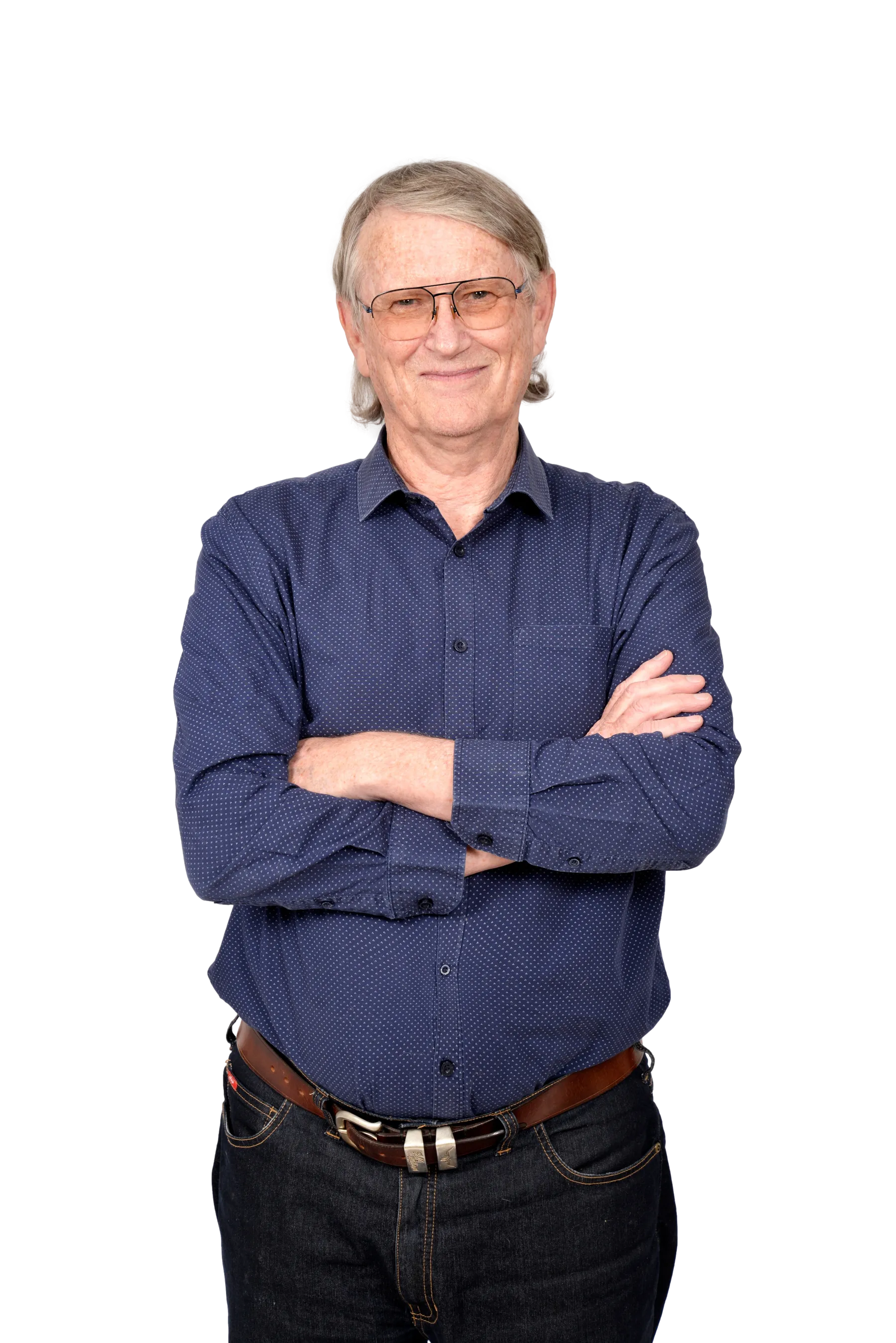 Rod Jones, arms folded, smiling